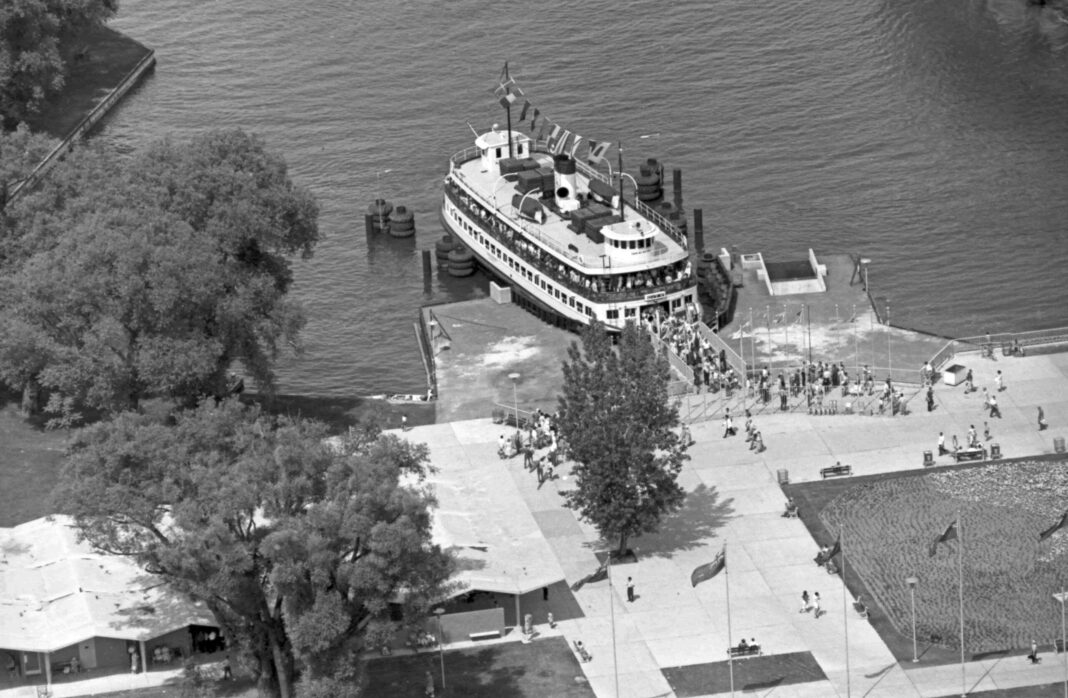 Hanlan's Point ferry dock is jammed with people leaving the Toronto Islands, July 2, 1962.