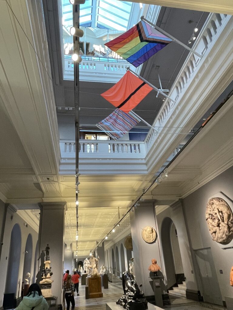 queer London. Flying the flags at Victoria and Albert Museum. Credit: Stuart Einer