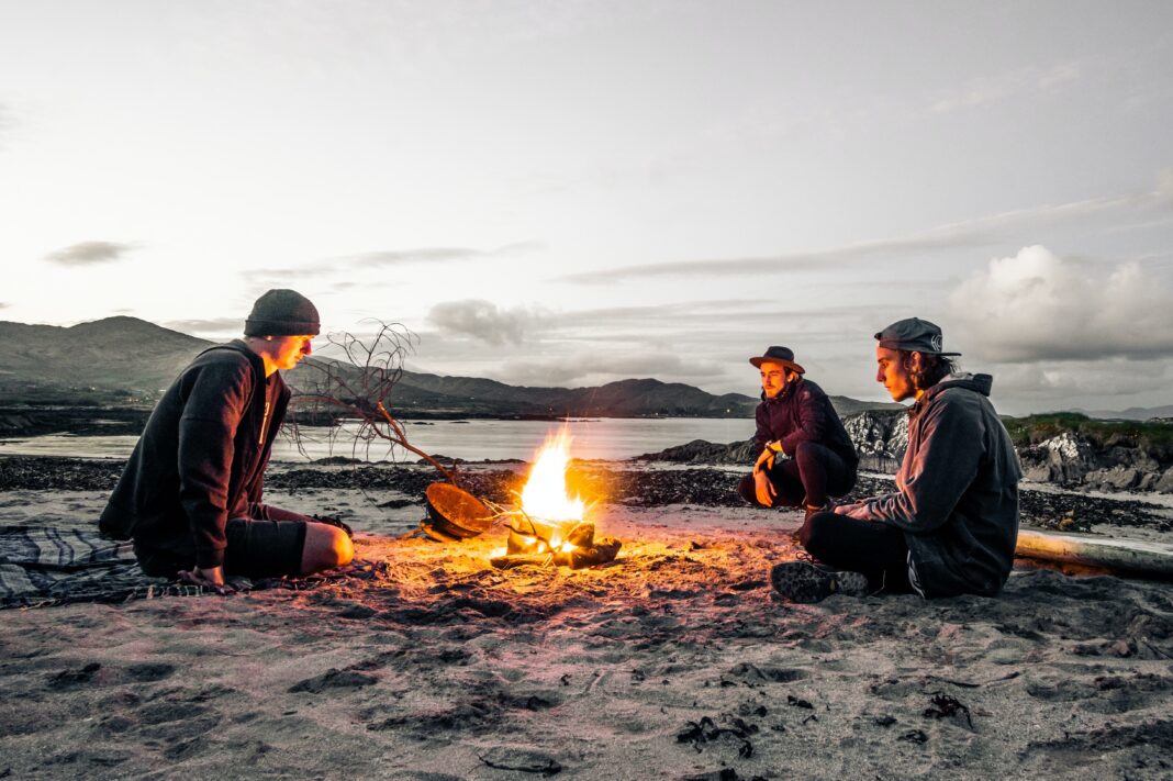 gay camping tips. Don’t let your weenie get too close to the fire. Photo by Andreas Wagner on Unsplash