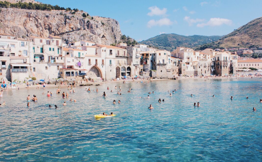 The beaches of Taormina are a historic LGBTQ+ destination. Credit: Ruth Troughton on Unsplash